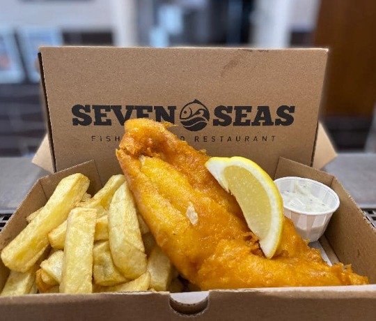Fish and chips and a takeaway box